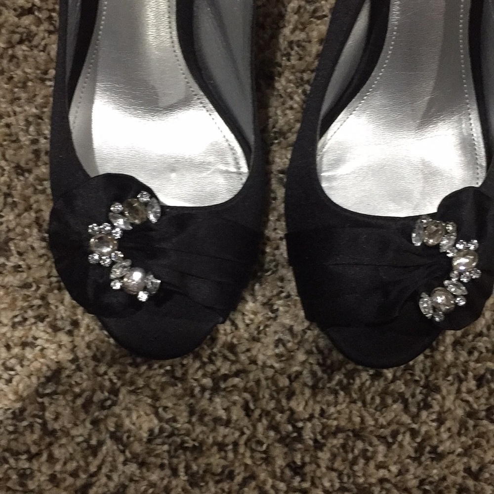 Black heels with rhinestone embellishments